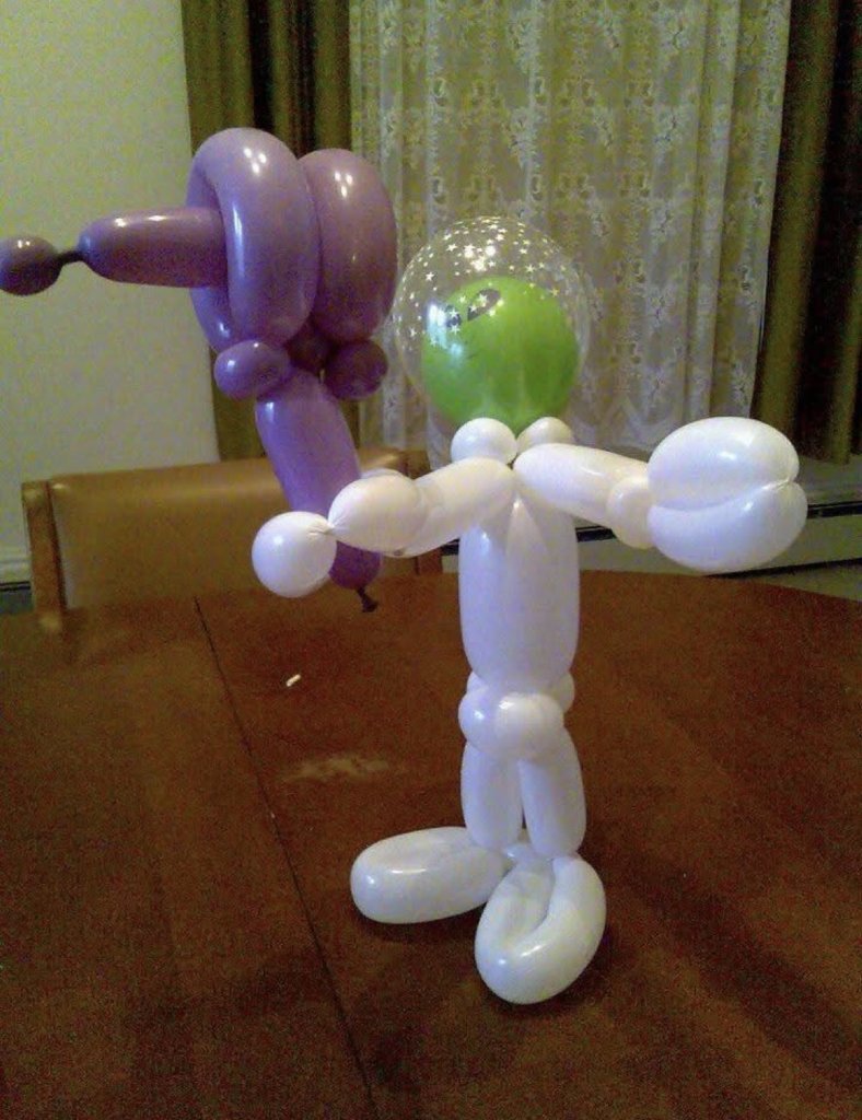 Balloon wizard and stickman sculptures