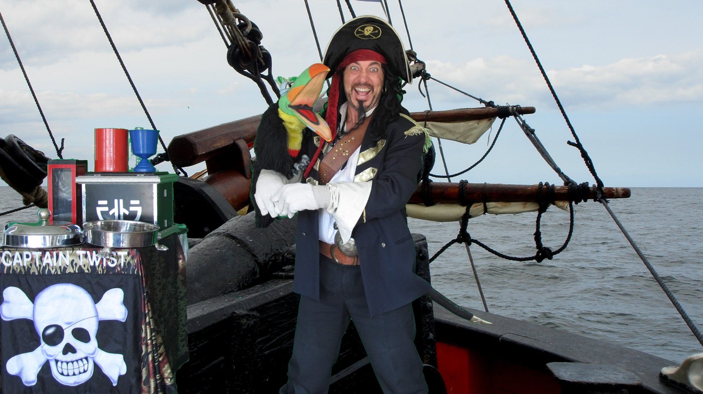 Dan Stewart as Captain Twist — pirate character with toucan puppet