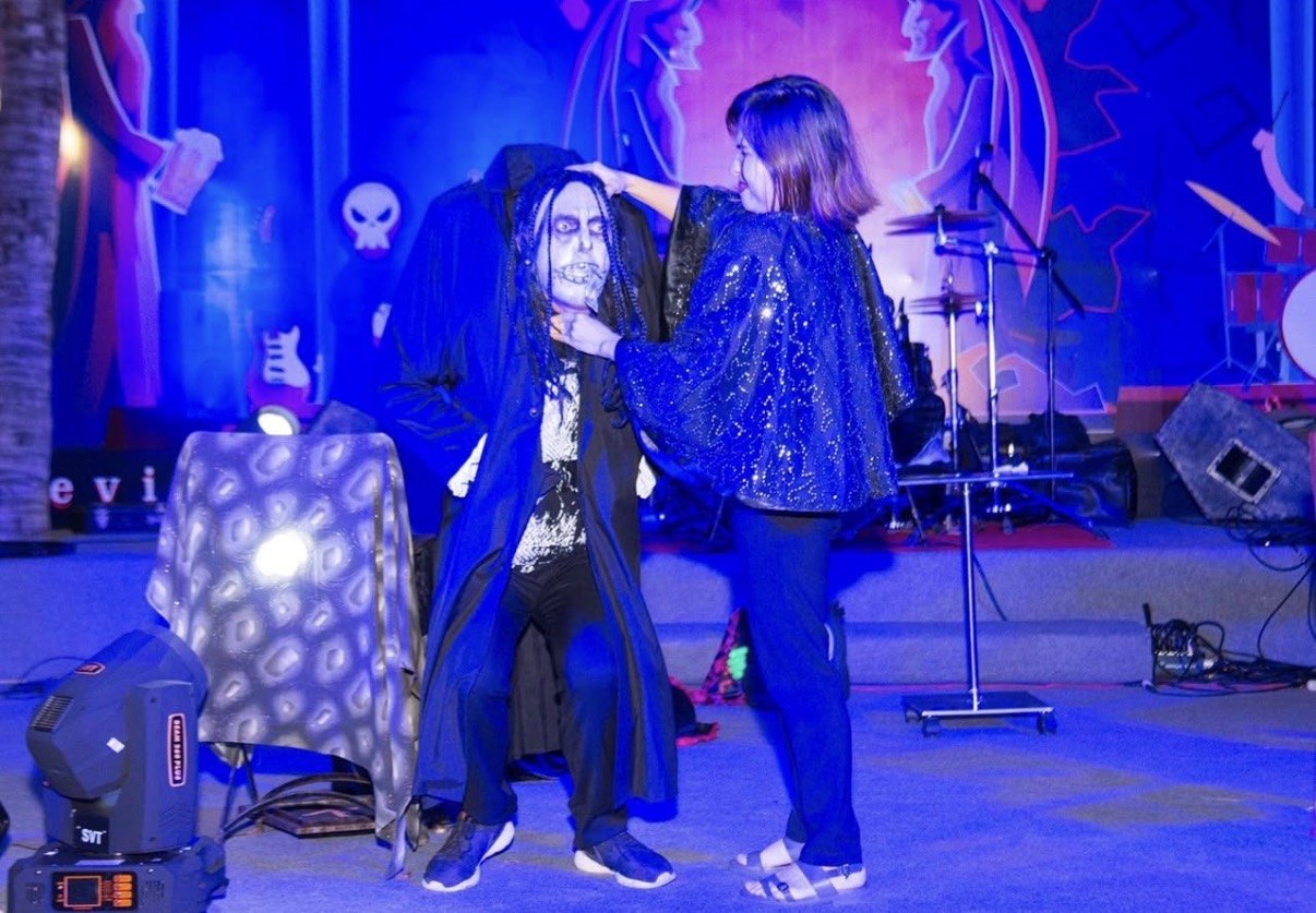 Amazing Mr Twist performing adult themed stage show with assistant
